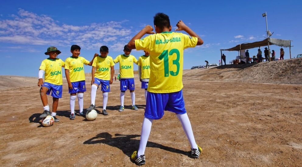 Children in Bajo Soga receive new sports apparel